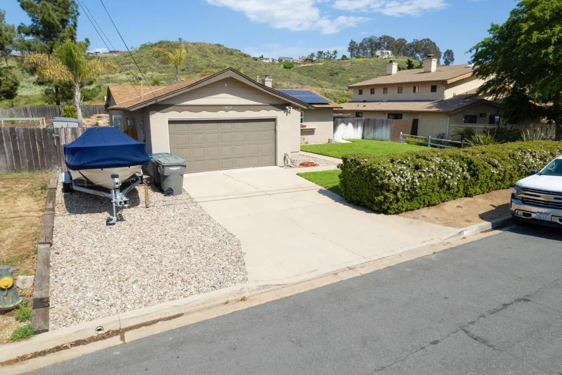 13829 Tobiasson Road Poway, CA 92064 - Photo 4 of 52 front view of a house with a yard