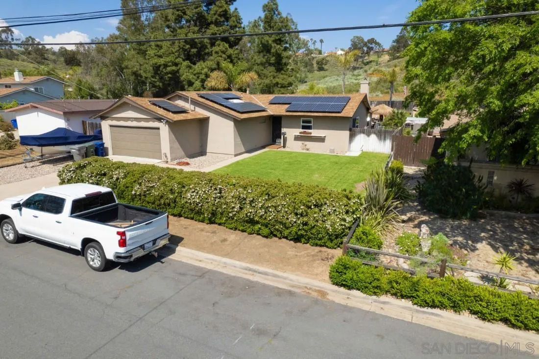 13829 Tobiasson Road Poway, CA 92064 - Photo 6 of 52 a car parked in front of a house