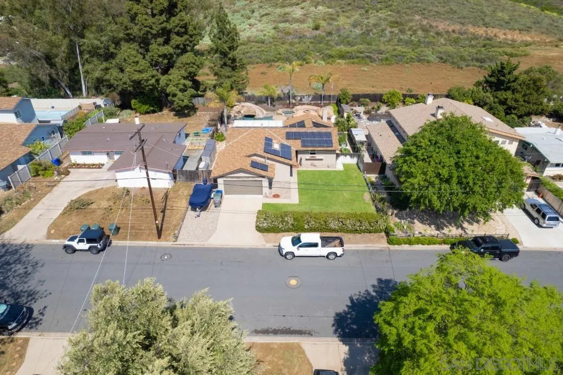 13829 Tobiasson Road Poway, CA 92064 - Photo 7 of 52 an aerial view of a house with a yard and lake view