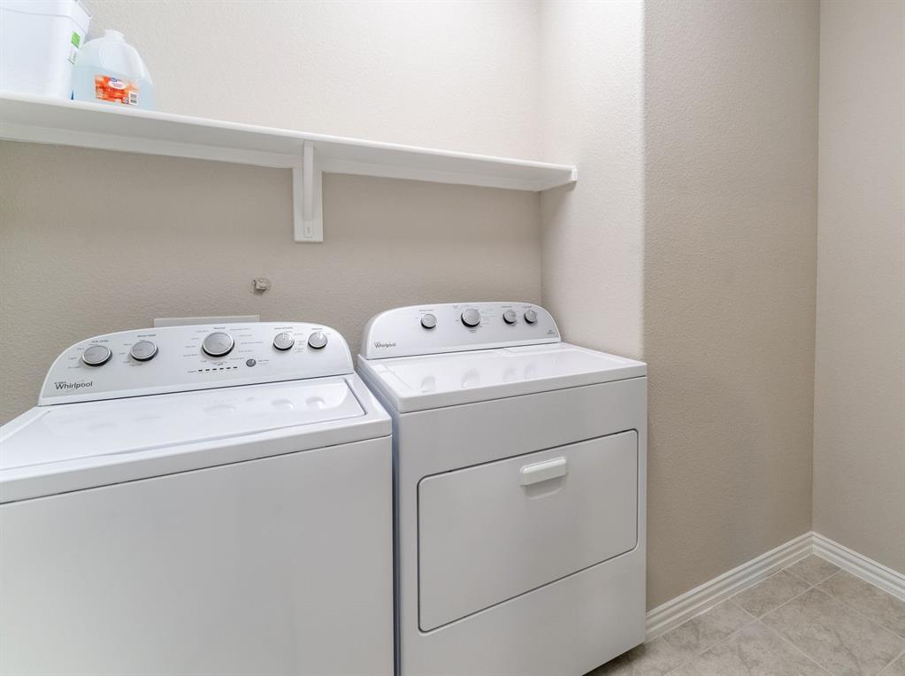 2020 Robert Street Anna, TX 75409 - Photo 13 of 16 a utility room with dryer and washer