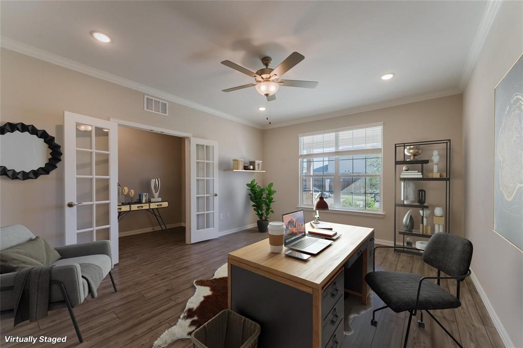 2020 Robert Street Anna, TX 75409 - Photo 4 of 16 a living room with furniture and wooden floor