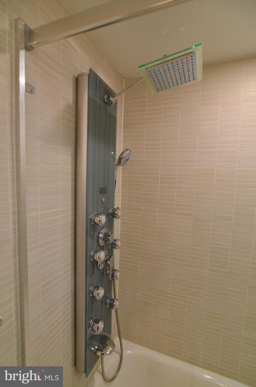 2114 N Street Northwest, Unit 2 Washington, DC 20037 - Photo 19 of 24 a bathroom with a shower