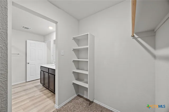 a view of a storage & utility room in a house