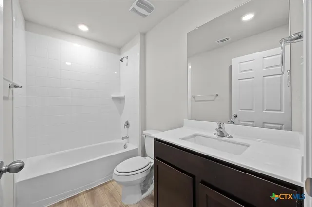 a view of a backyard with a garden