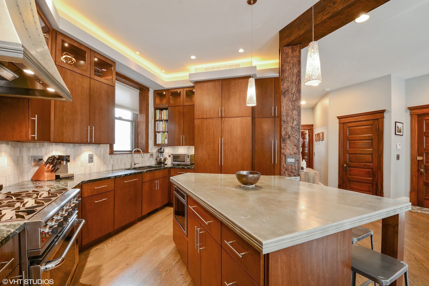 2608 North Dayton Street, Unit 1S Chicago, IL 60614 - Photo 6 of 17 a kitchen with stainless steel appliances granite countertop a sink a stove and a refrigerator