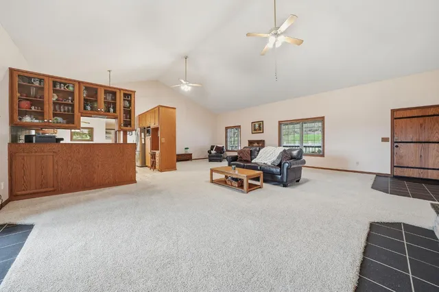 a kitchen with stainless steel appliances a cabinets and refrigerator