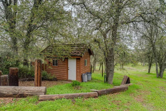 a view of a livingroom with furniture and a flat screen tv