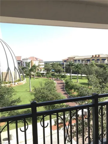 a view of a lake from a balcony