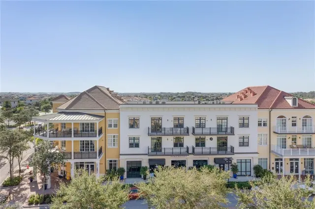 a large building with a lot of plants