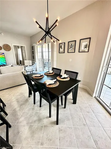 a view of a livingroom with furniture and window