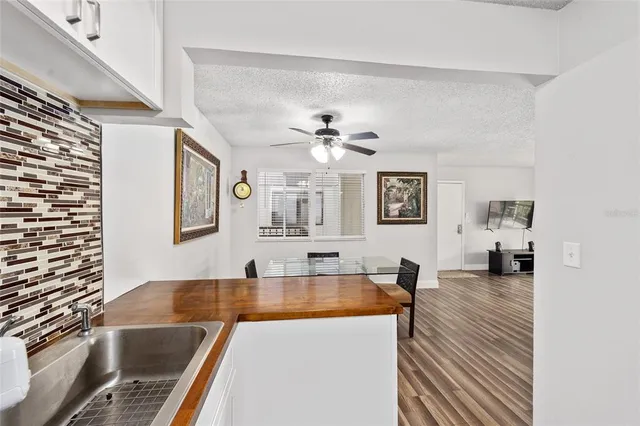 a view of a living room and dining room