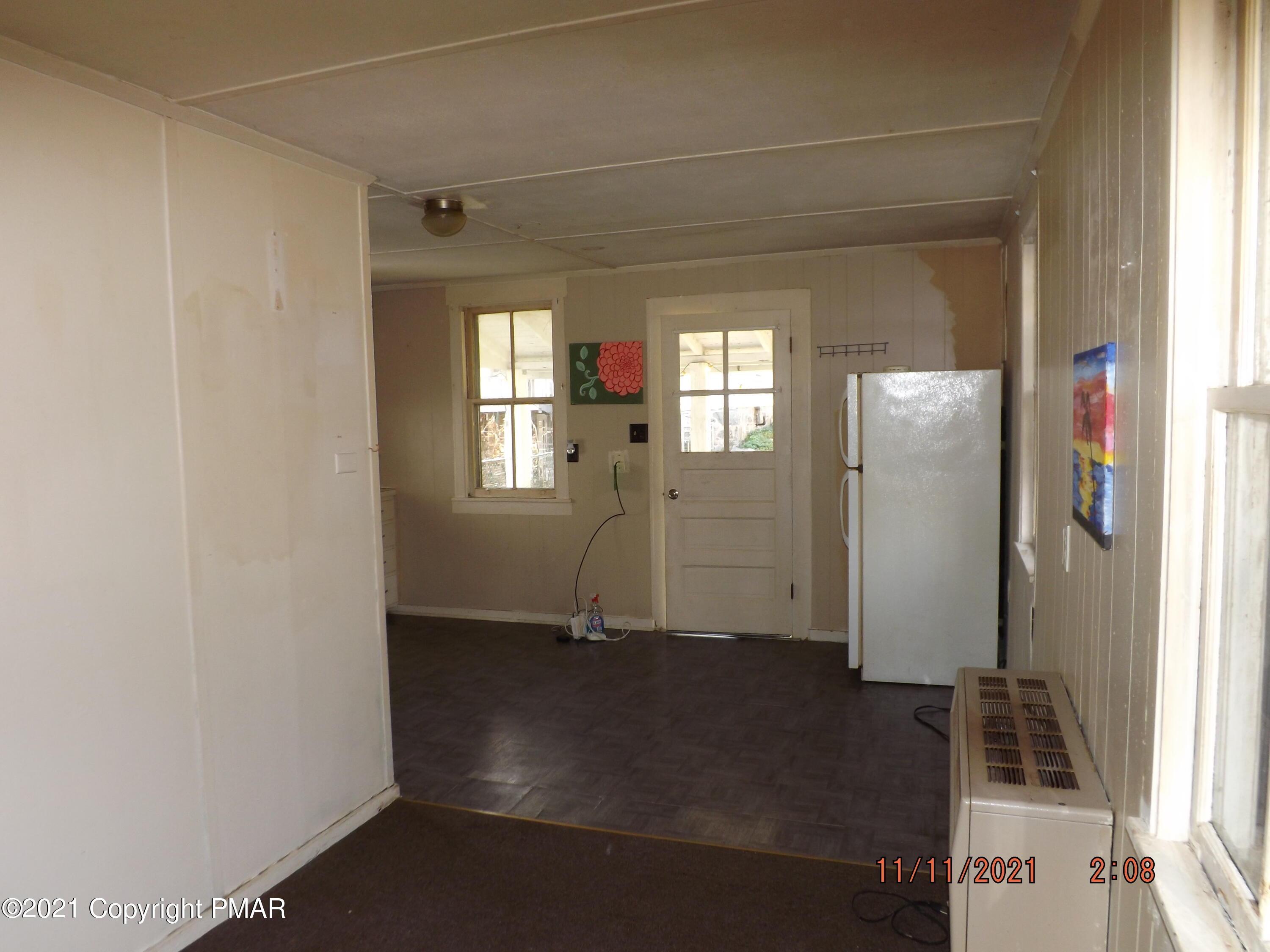 5474 Paradise Valley Road Cresco, PA 18326 - Photo 25 of 34 an empty room with windows