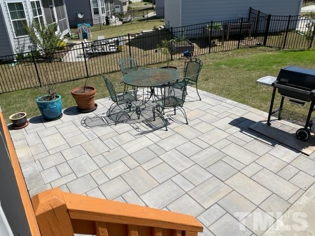 1425 Barn Door Drive Apex, NC 27502 - Photo 23 of 43 a view of a chairs and table in backyard