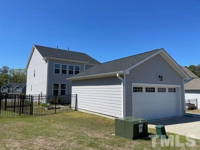 1425 Barn Door Drive Apex, NC 27502 - Photo 3 of 43 a front view of a house with a yard