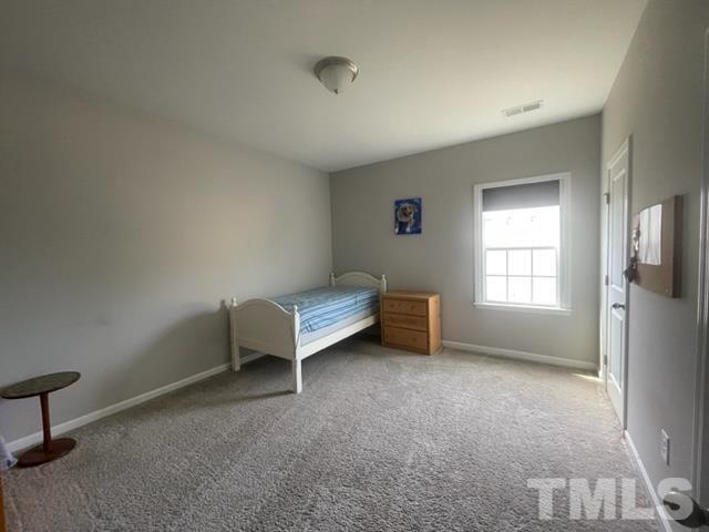 1425 Barn Door Drive Apex, NC 27502 - Photo 31 of 43 a view of room with window and a ceiling fan