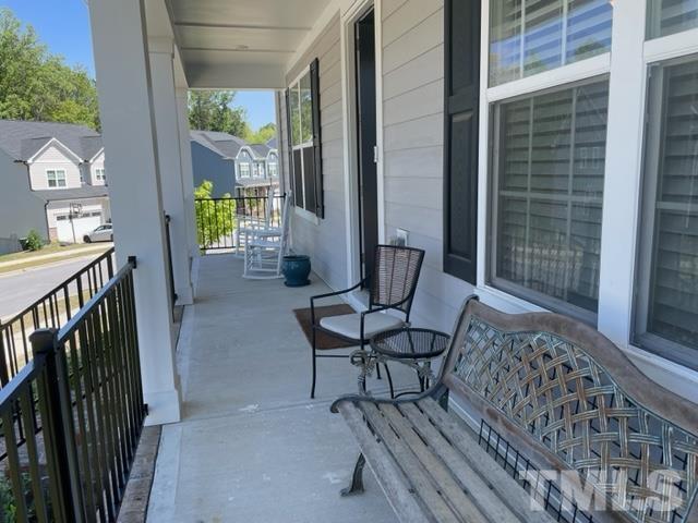 1425 Barn Door Drive Apex, NC 27502 - Photo 4 of 43 a view of a balcony with furniture
