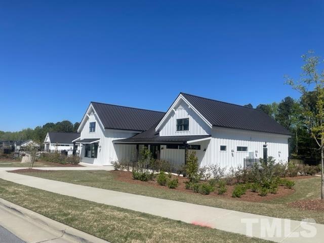 1425 Barn Door Drive Apex, NC 27502 - Photo 41 of 43 a front view of a house with a yard