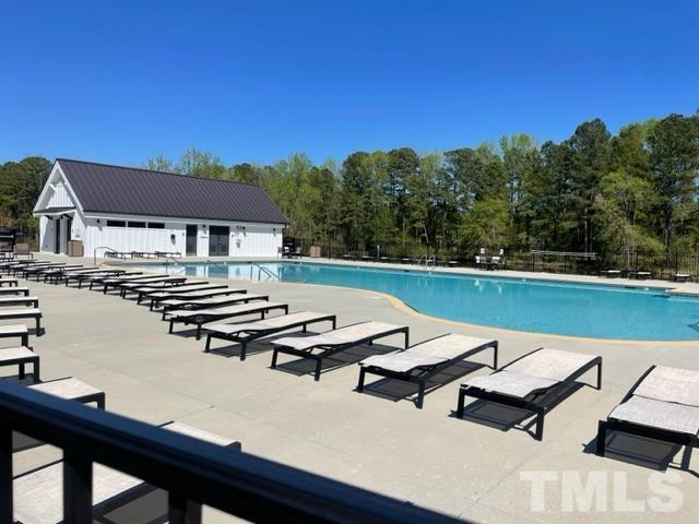 1425 Barn Door Drive Apex, NC 27502 - Photo 42 of 43 a view of a patio with swimming pool