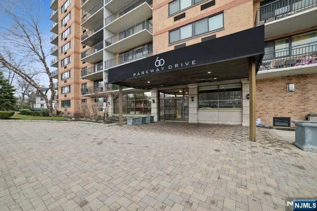 a view of a building with a street