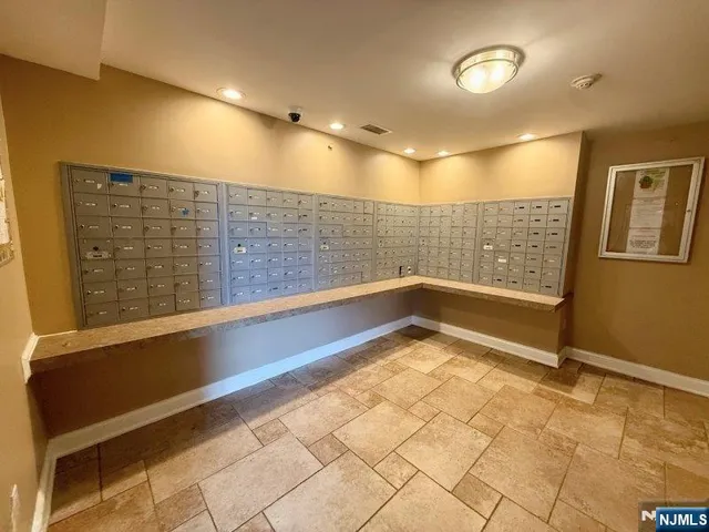 a room with gym equipment and a large window