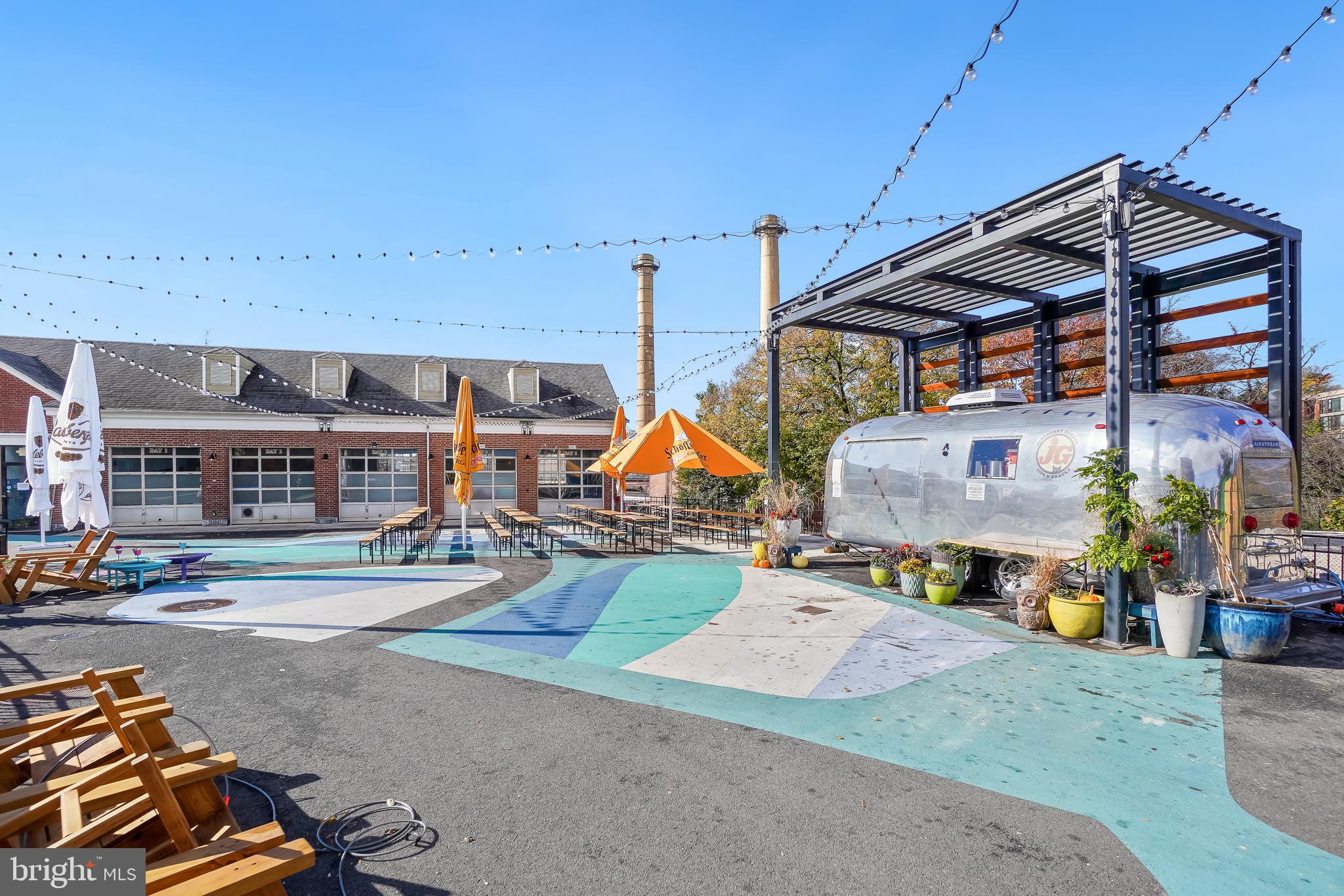 7175 12th Street Northwest, Unit 302 Washington, DC 20012 - Photo 57 of 60 Juneberry Garage for outdoor happy hour & dining