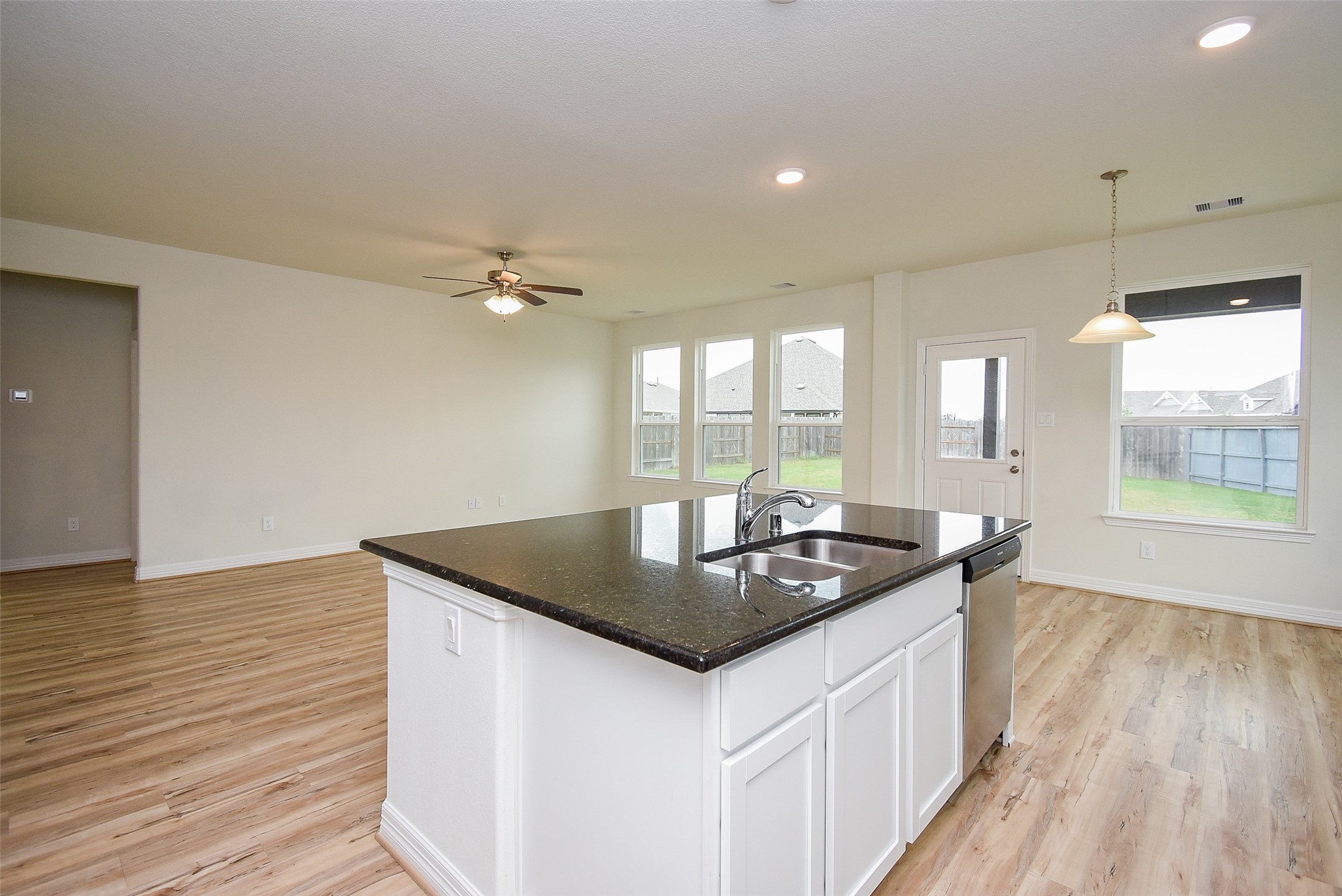 32426 Fly Fish Way Fulshear, TX 77441 - Photo 12 of 32 a kitchen with sink and window