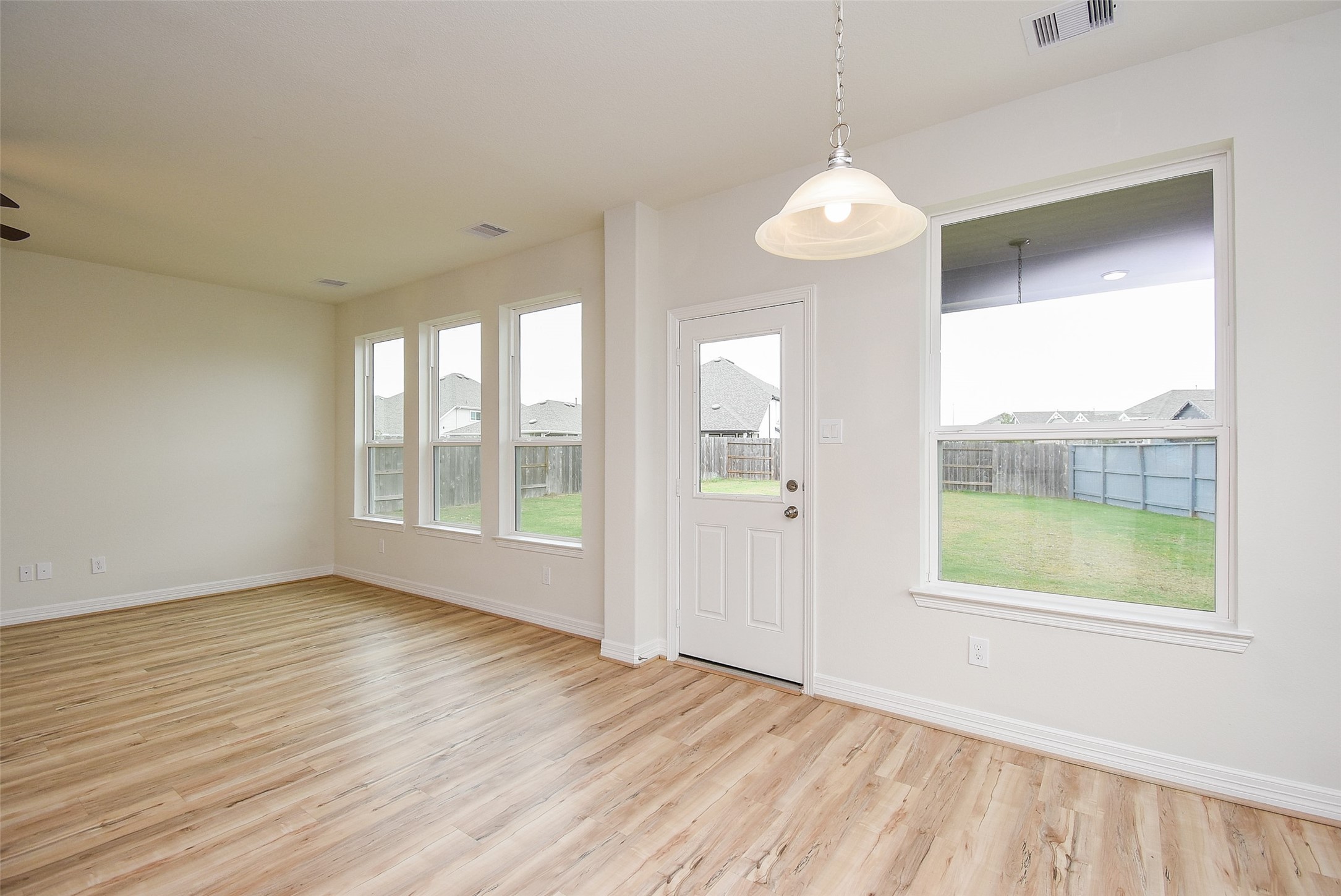 32426 Fly Fish Way Fulshear, TX 77441 - Photo 16 of 32 a view of an empty room with a window