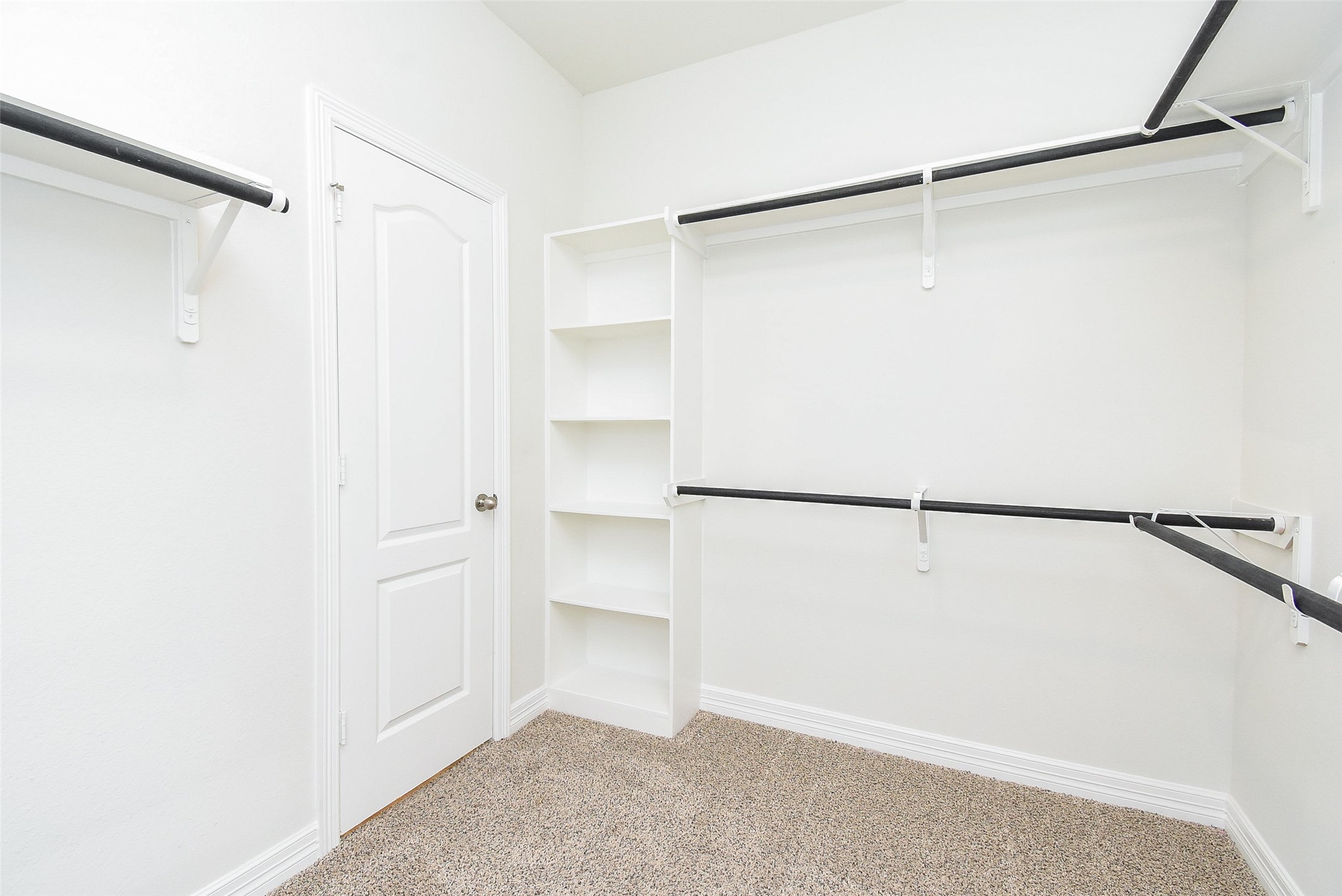 32426 Fly Fish Way Fulshear, TX 77441 - Photo 22 of 32 a view of an empty walk in closet