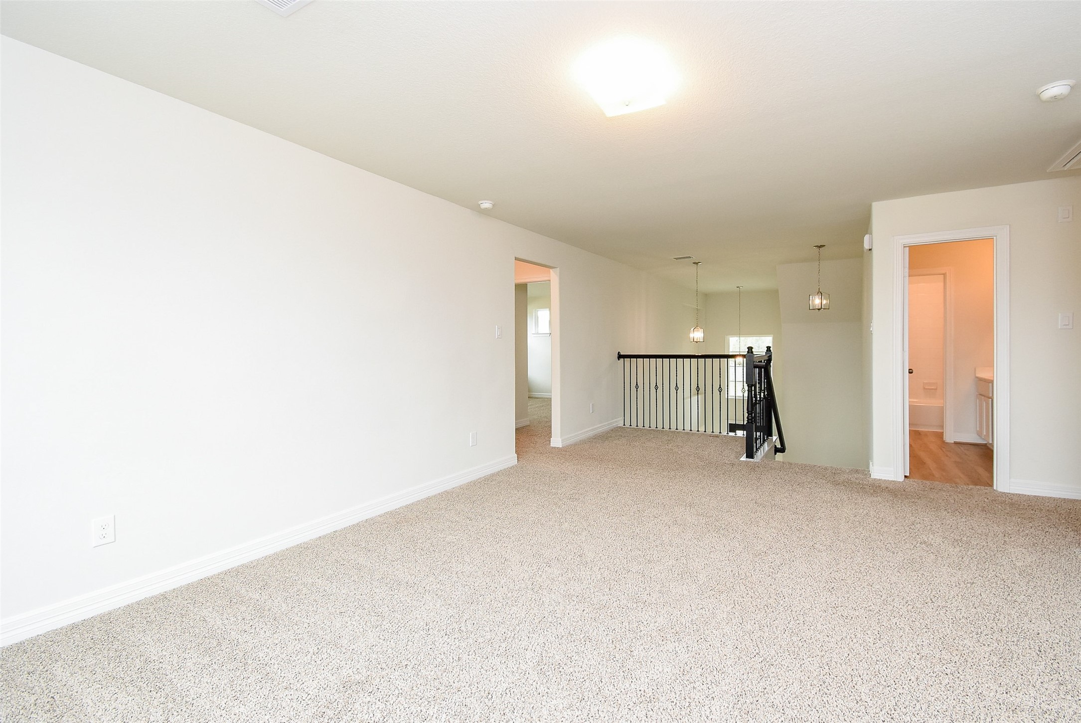 32426 Fly Fish Way Fulshear, TX 77441 - Photo 23 of 32 an empty room with closet and bathroom view