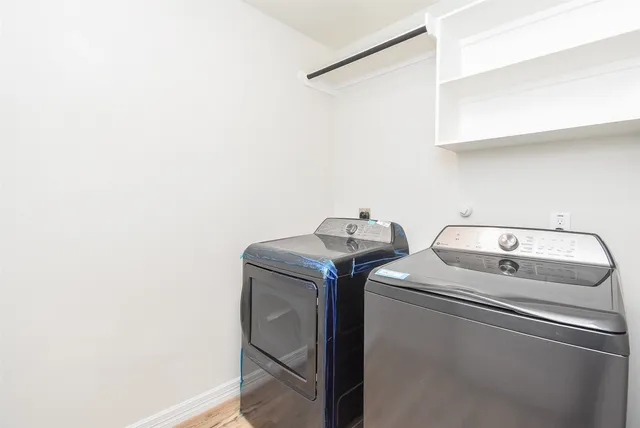 a utility room with dryer and washer