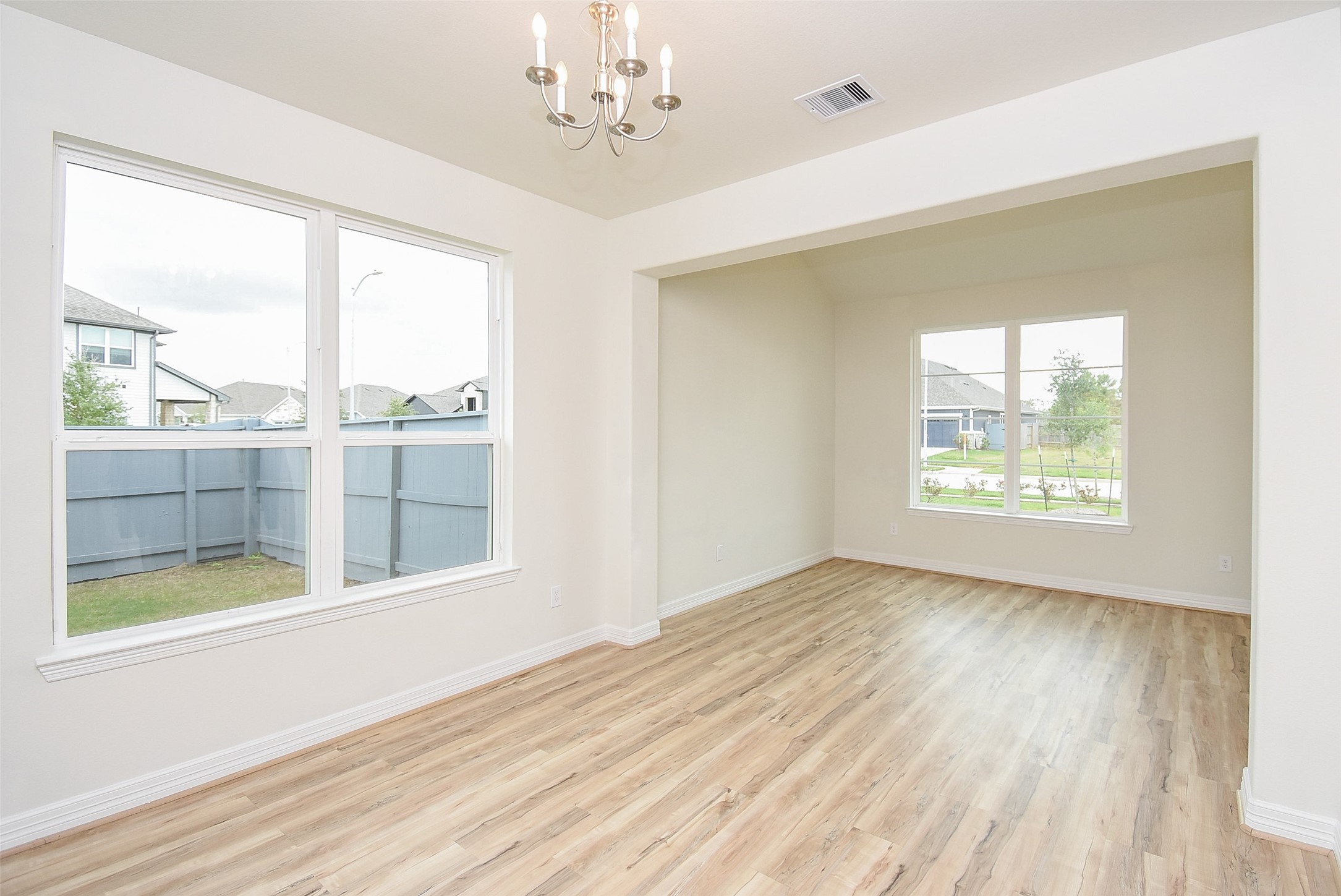 32426 Fly Fish Way Fulshear, TX 77441 - Photo 7 of 32 a view of an empty room with a window