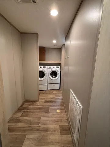 a bathroom with a sink a mirror and shower view