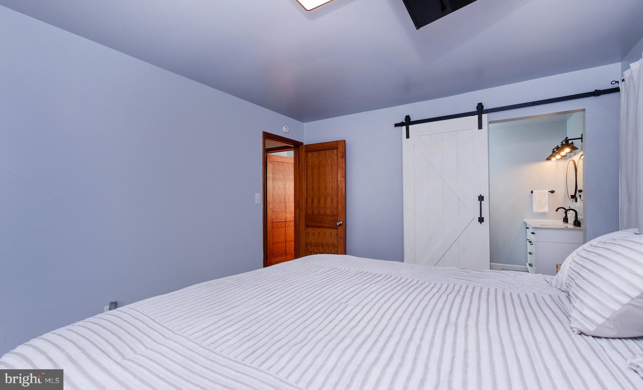 6331 B Old Carlisle Road Dover, PA 17315 - Photo 17 of 40 Primary Bedroom. Grey Colored Walls.