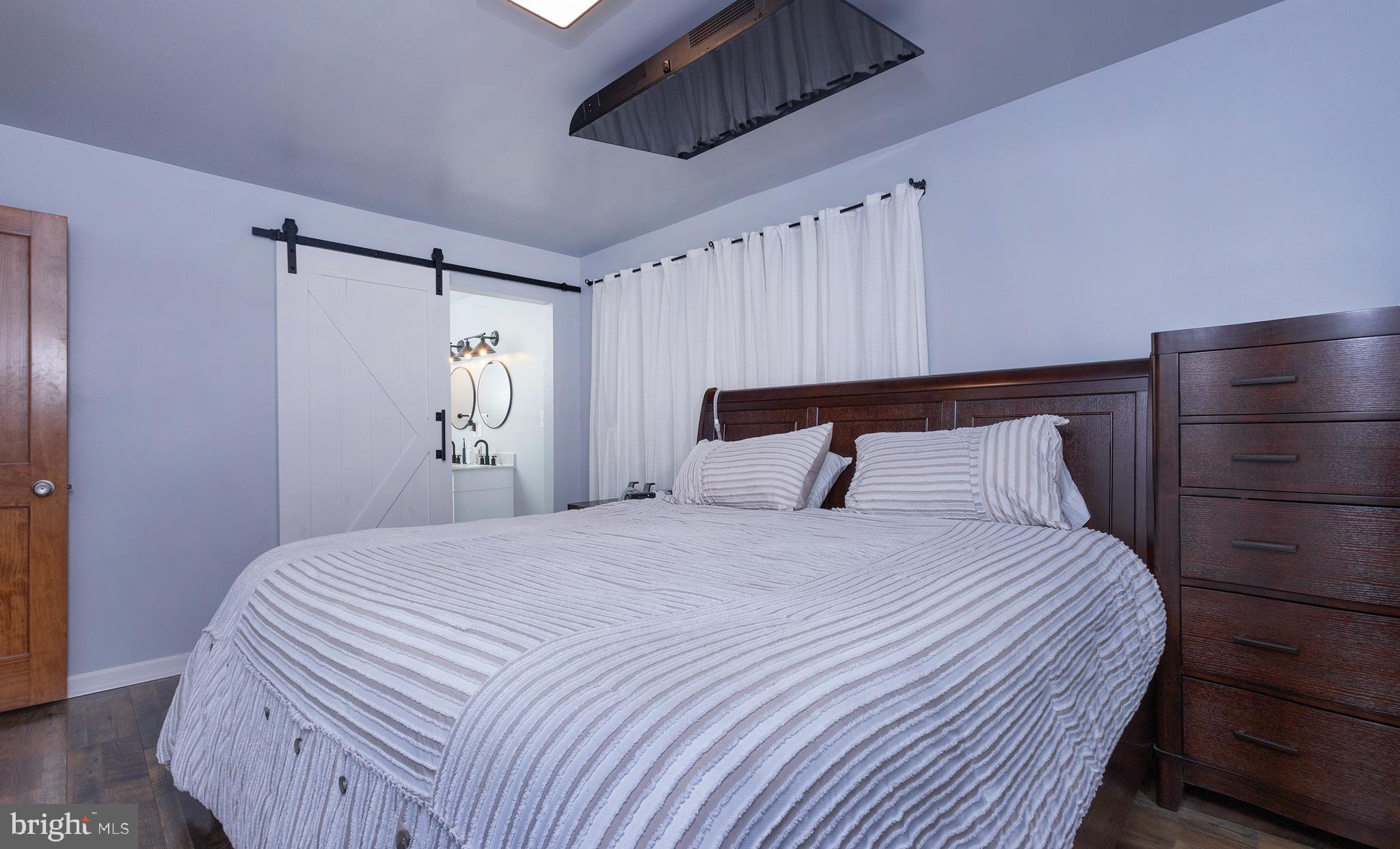 6331 B Old Carlisle Road Dover, PA 17315 - Photo 18 of 40 Barn door to Updated Bath.