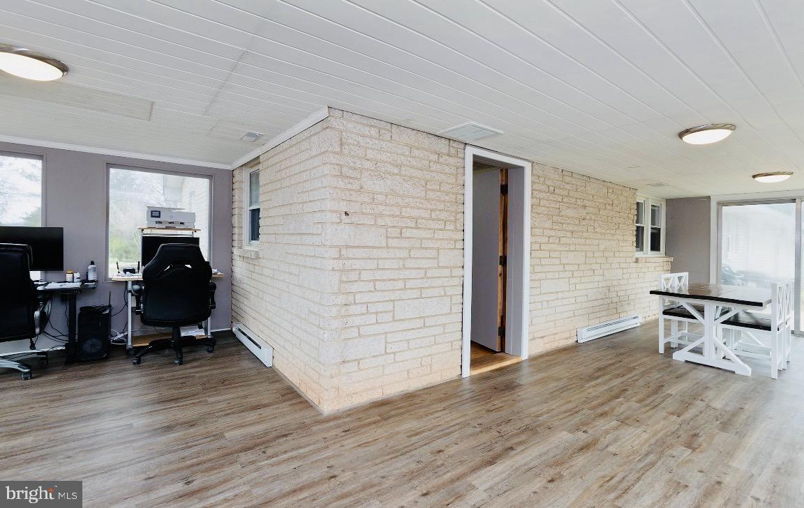 6331 B Old Carlisle Road Dover, PA 17315 - Photo 27 of 40 L-Shaped Sunroom off 2nd Bedroom.