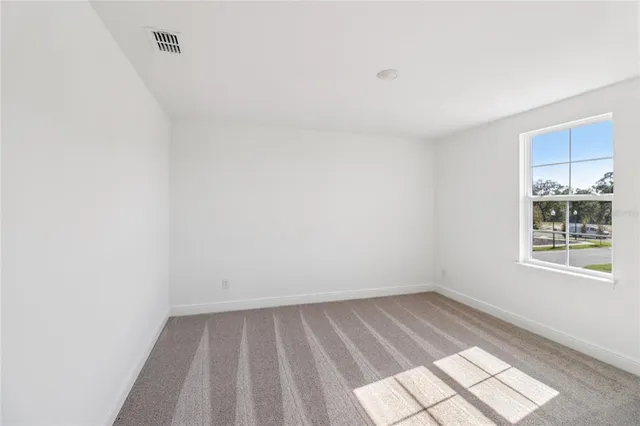 a front view of house with yard and outdoor seating