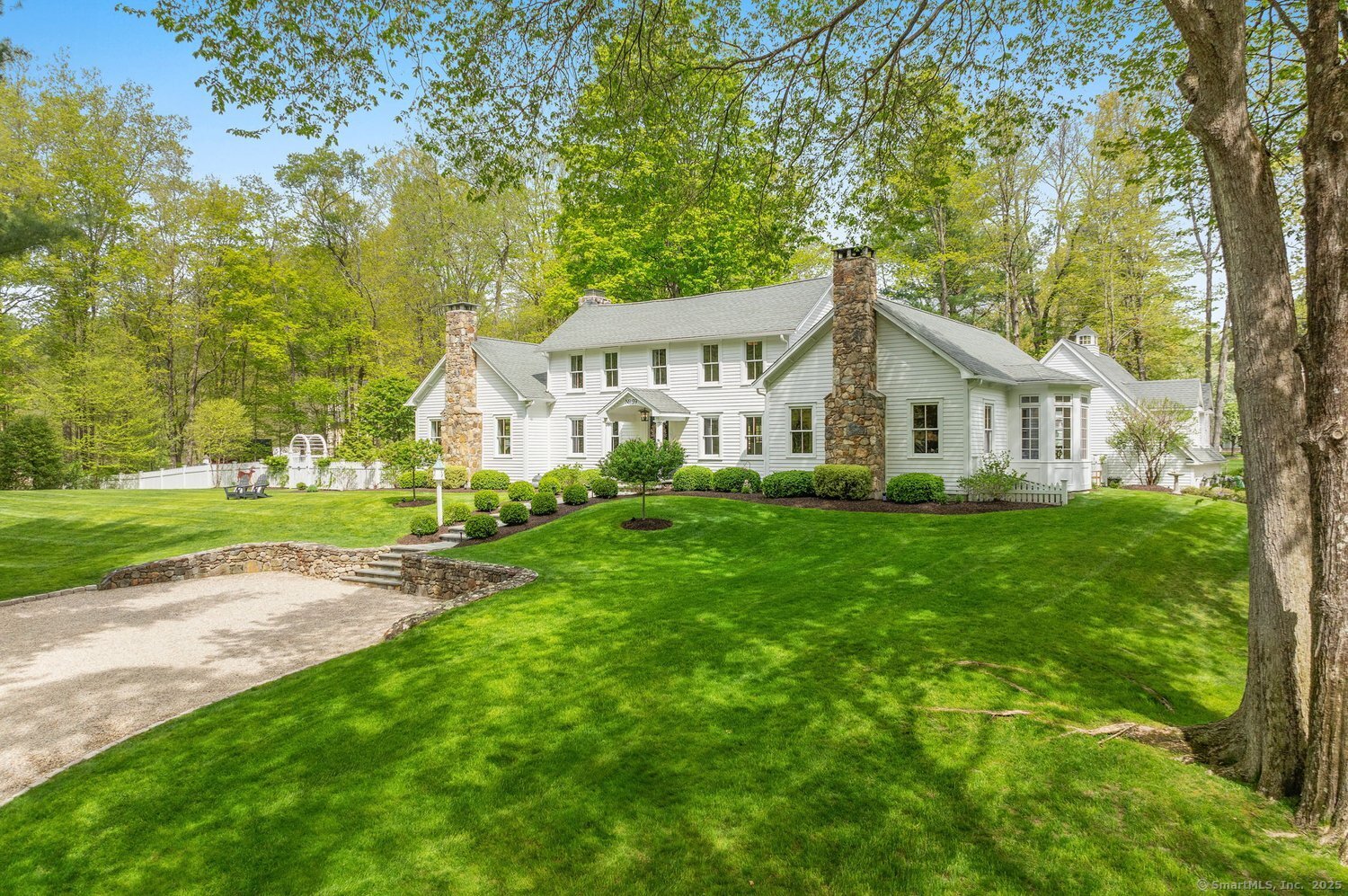 a view of house with a yard