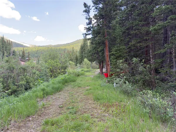 a view of a backyard of a house