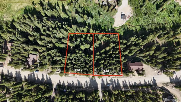 a view of outdoor space with trees all around