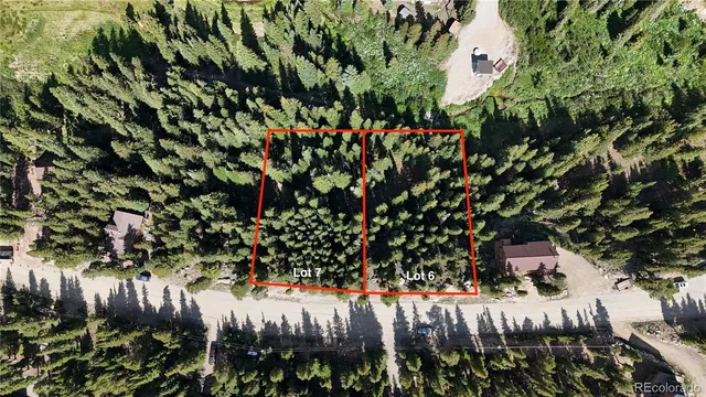 a view of outdoor space with trees all around