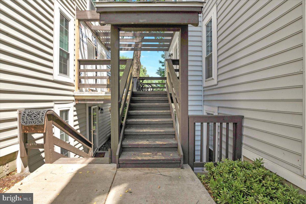 10096 Oakton Terrace Road, Unit 10096 Oakton, VA 22124 - Photo 2 of 24 a view of a entryway door front of house