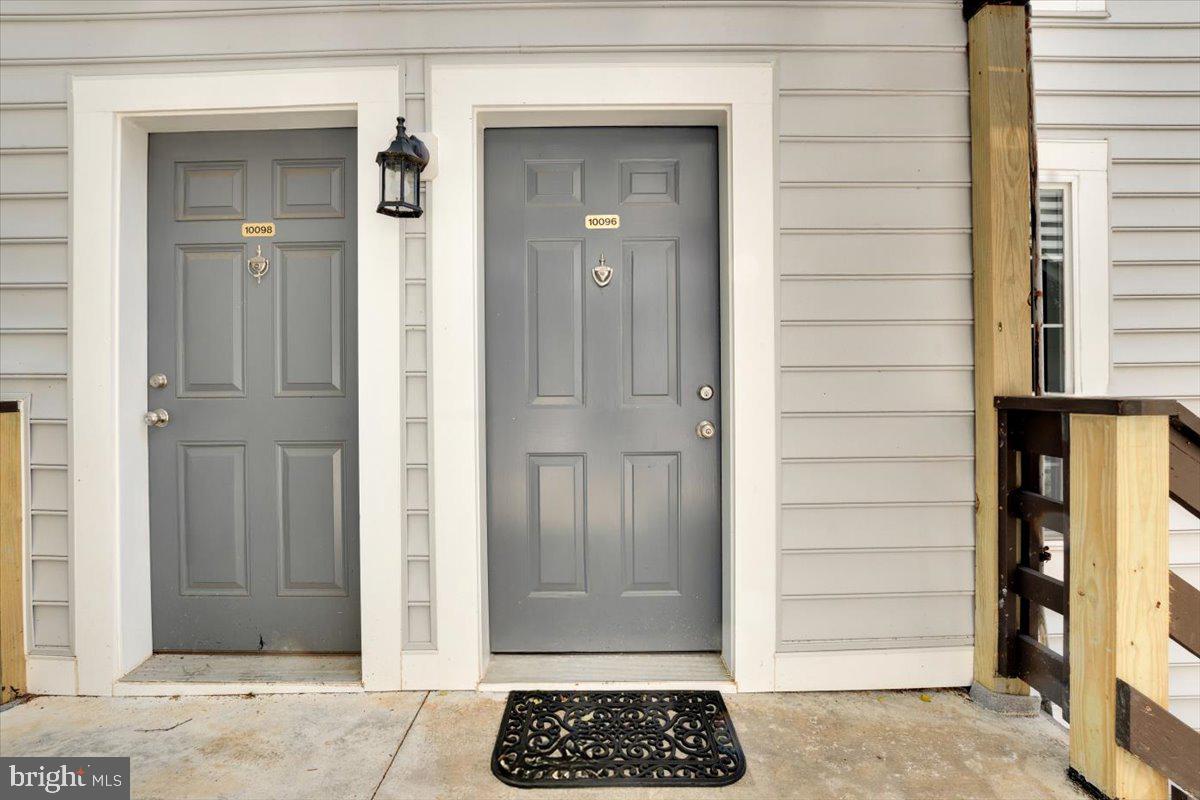 10096 Oakton Terrace Road, Unit 10096 Oakton, VA 22124 - Photo 3 of 24 a view of a entryway door of the house