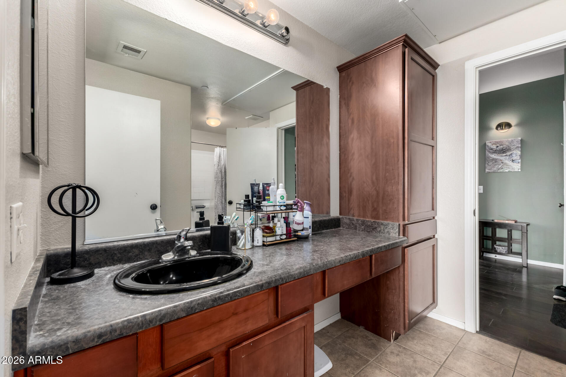 3302 North 7th Street, Unit 232 Phoenix, AZ 85014 - Photo 17 of 47 a bathroom with a sink and a mirror