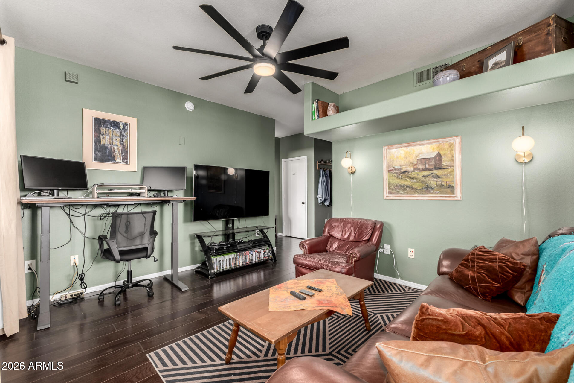 3302 North 7th Street, Unit 232 Phoenix, AZ 85014 - Photo 2 of 47 a living room with furniture and a flat screen tv