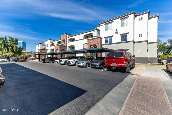 a view of a cars parked in front of a building