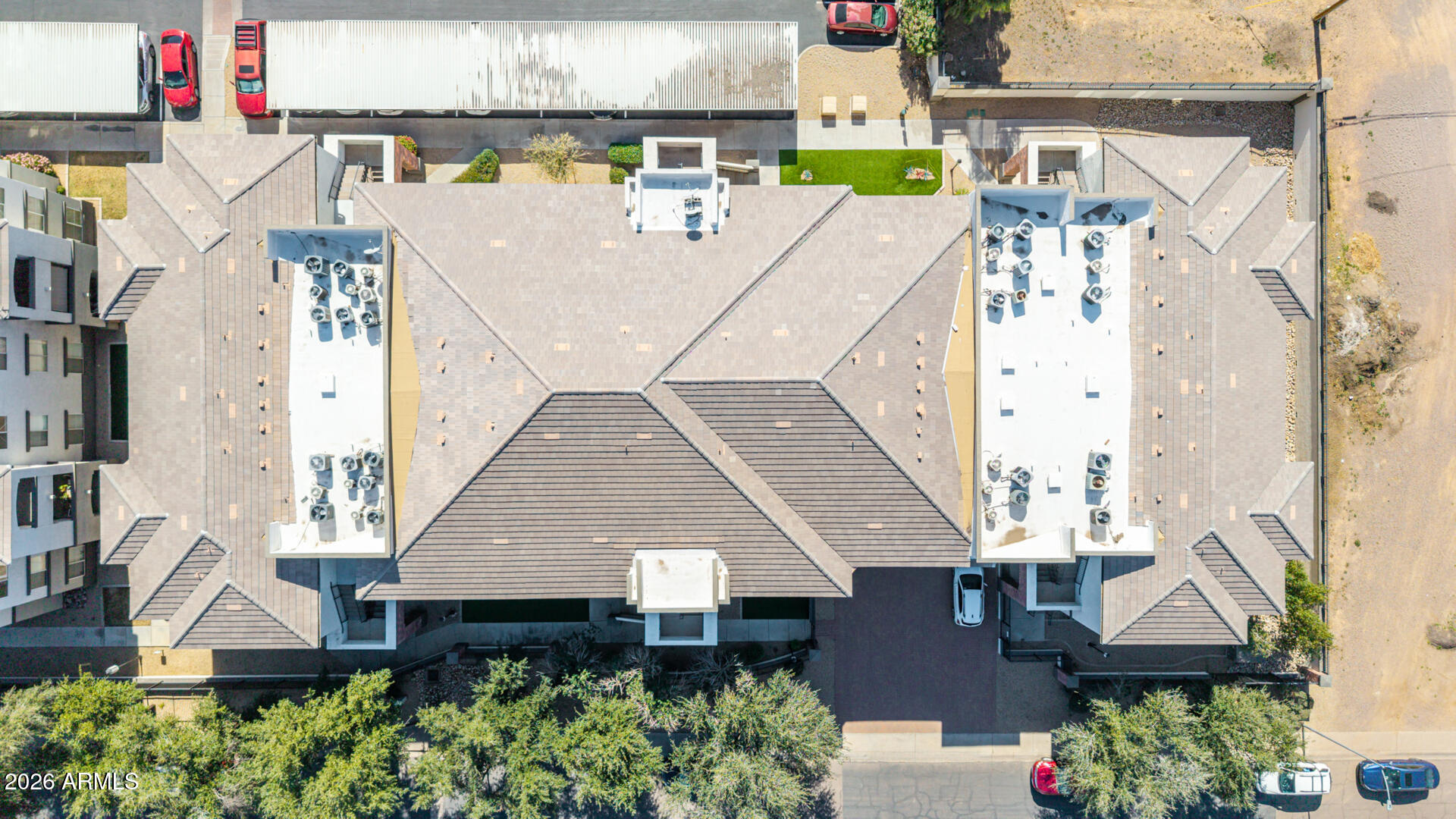 3302 North 7th Street, Unit 232 Phoenix, AZ 85014 - Photo 34 of 47 an aerial view of a house with swimming pool and outdoor seating