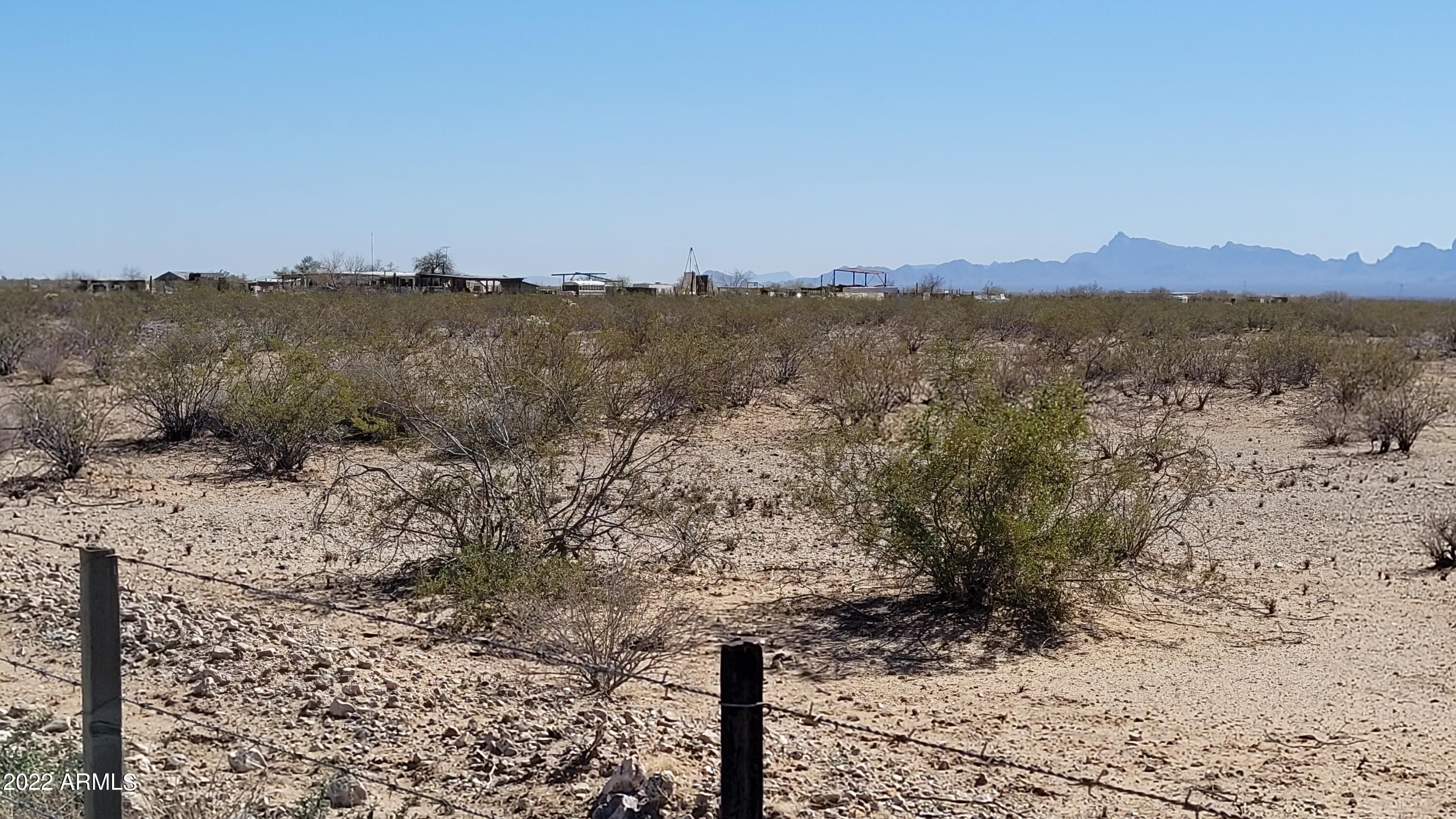 777-xx West Salome Road Salome, AZ 85348 - Photo 4 of 17 a view of a lake with mountains in the background