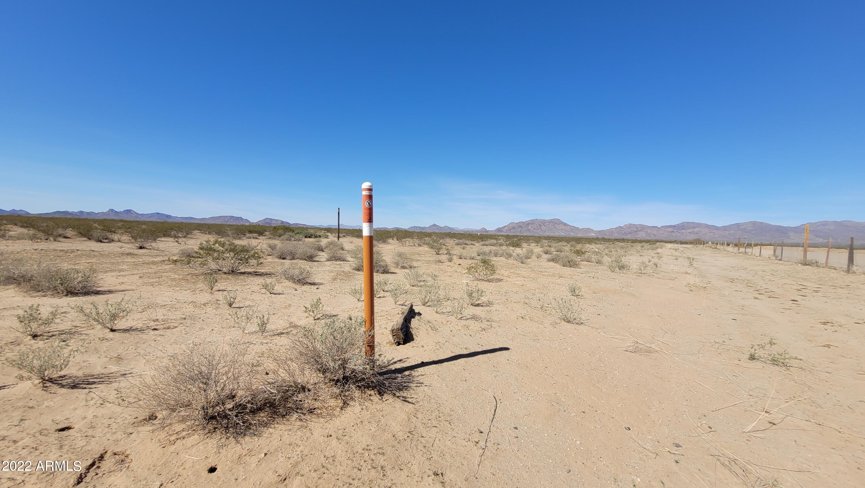 777-xx West Salome Road Salome, AZ 85348 - Photo 7 of 17 a view of a lake with a beach