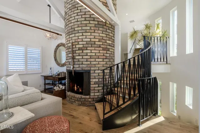 a view of livingroom with furniture and floor to ceiling window