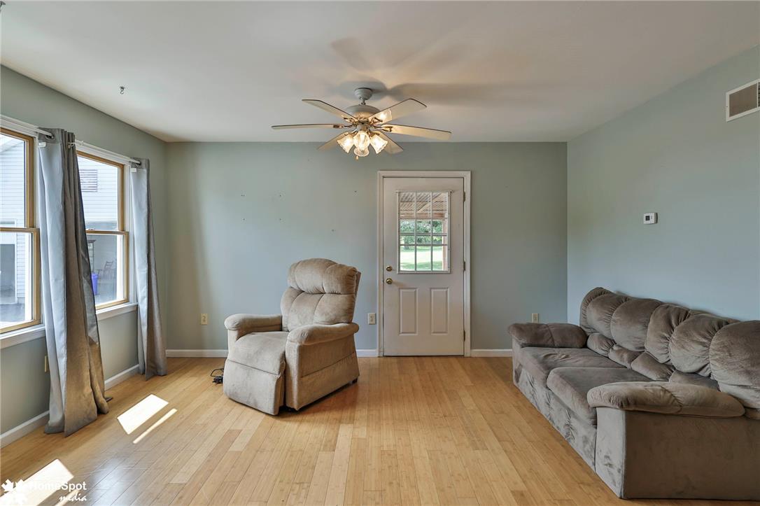 829 Georgetown Road Nazareth, PA 18064 - Photo 41 of 54 In-law suite. Warm bamboo flooring runs throughout this inviting living space illuminated by multiple windows.